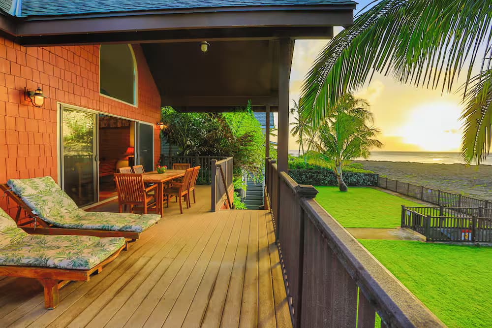 North Shore home with a beautiful sunset and view of migrating whales